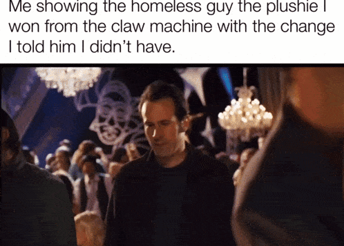 a man is standing in a crowd with a caption that says me showing the homeless guy