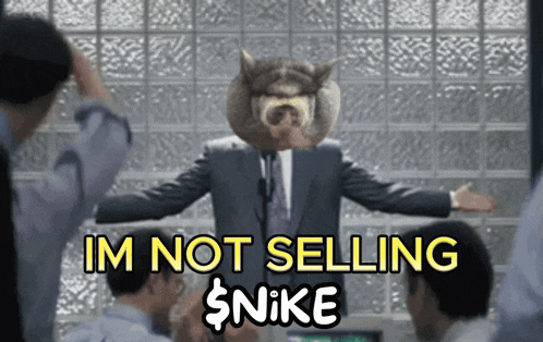 a man in a suit with a dog 's head and the words im not selling $ nike