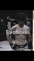 a man in a boxing ring with the words evoliniii written on his chest