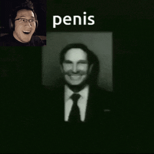 a picture of a man in a suit and tie with the word penis behind him
