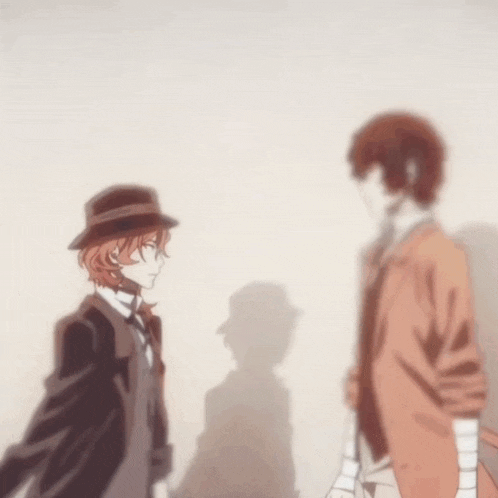 a couple of anime characters standing next to each other with one having a bandage on his arm
