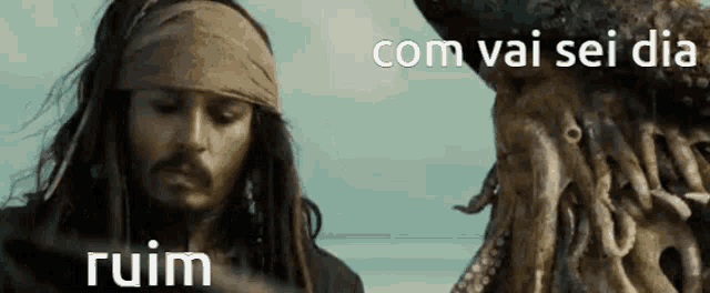 jack sparrow from pirates of the caribbean is standing next to a giant squid .