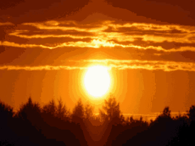 the sun shines brightly through the clouds in the sky