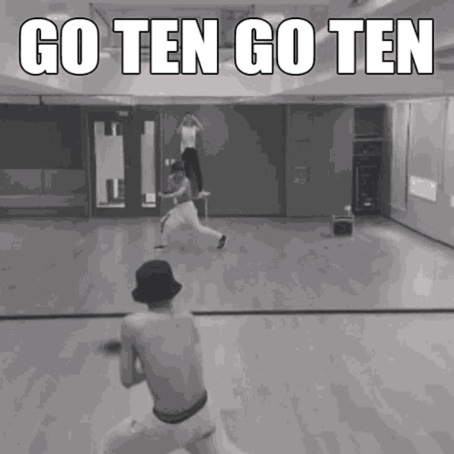 a black and white photo with the words go ten go ten on the bottom