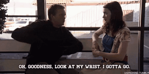 a man and a woman are sitting on a bench and the woman says oh goodness look at my wrist i gotta go .