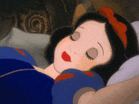 a cartoon of snow white sleeping in a bed with her eyes closed