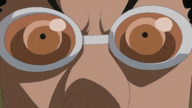 a close up of a person 's eyes with a white rim