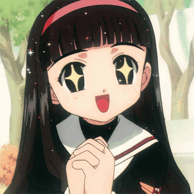 a close up of a girl with a star in her eye
