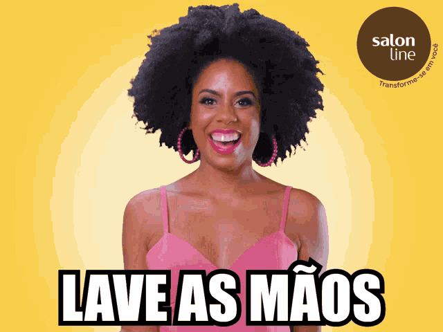 a woman in a pink dress is smiling in front of a yellow background with the words " lave as mãos " on it