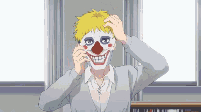a man is wearing a clown mask with a big smile on his face