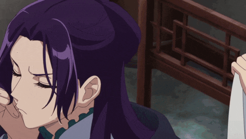 a woman with purple hair is holding a white towel