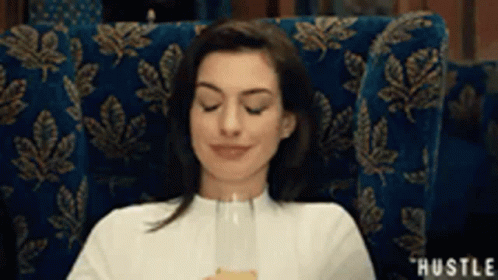 Yes Anne Hathaway GIF - Yes Anne Hathaway Cheers GIFs