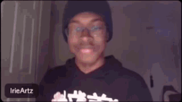 a blurry picture of a person with flames on their face