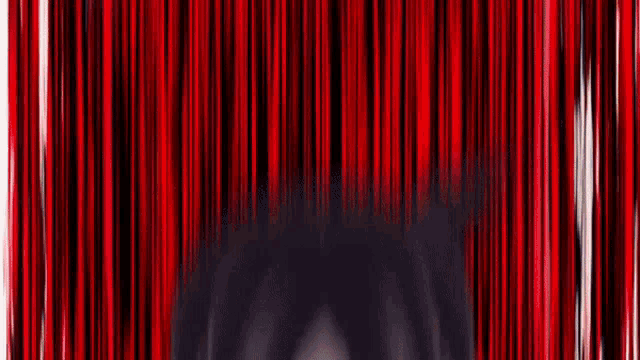 a close up of a girl 's face with blood coming out of it .