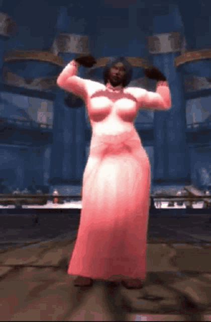 a woman in a pink dress is standing in a large room