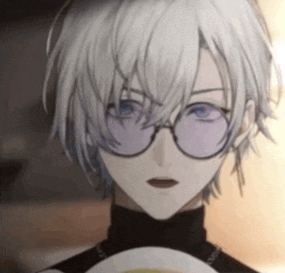 a close up of a person with white hair and glasses .