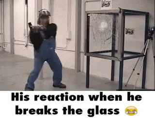 His Reaction When He Breaks The Glass GIF - Loop Hammer Glass GIFs