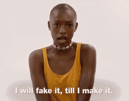 a woman is wearing a yellow tank top and a necklace and says `` i will fake it , till i make it ''