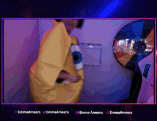 a person in a banana costume is dancing in front of a wheel