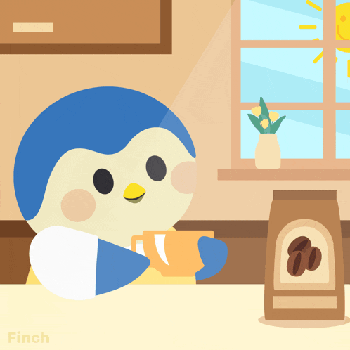 a penguin is sitting at a table holding a cup of coffee next to a bag of coffee
