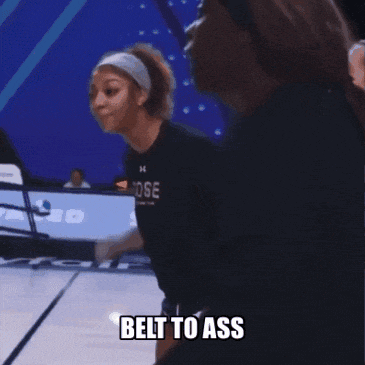 a group of female basketball players are cheering and one of them is wearing a shirt that says rose