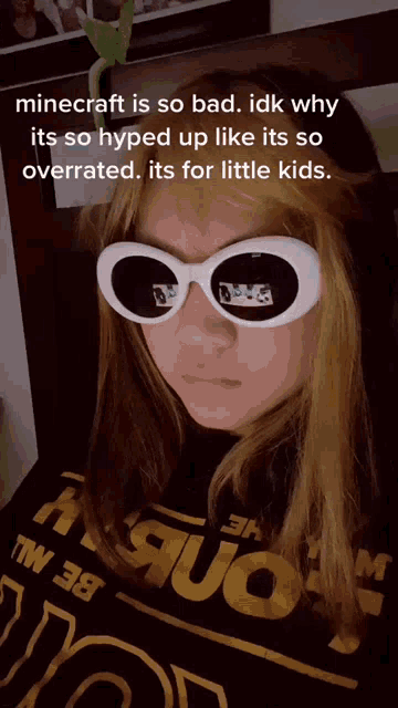 a girl wearing sunglasses says that minecraft is so bad