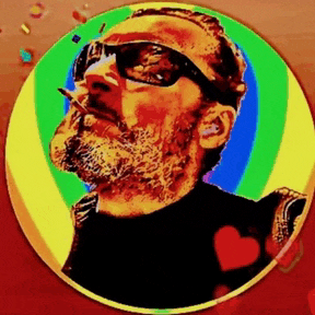 a man with a beard is wearing sunglasses and smoking a cigarette in a colorful circle