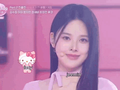 a girl with a hello kitty on her face and the name jeemin on the bottom right