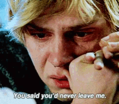 a close up of a person 's face with the words " you said you 'd never leave me "