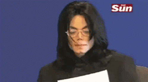 Reading Michael Jackson GIF - Reading Michael Jackson The Sun GIFs