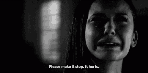 a woman is crying in a black and white photo with the words `` please make it stop , it hurts '' .