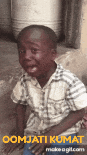 a gif of a boy with the words oomjati kumat on it