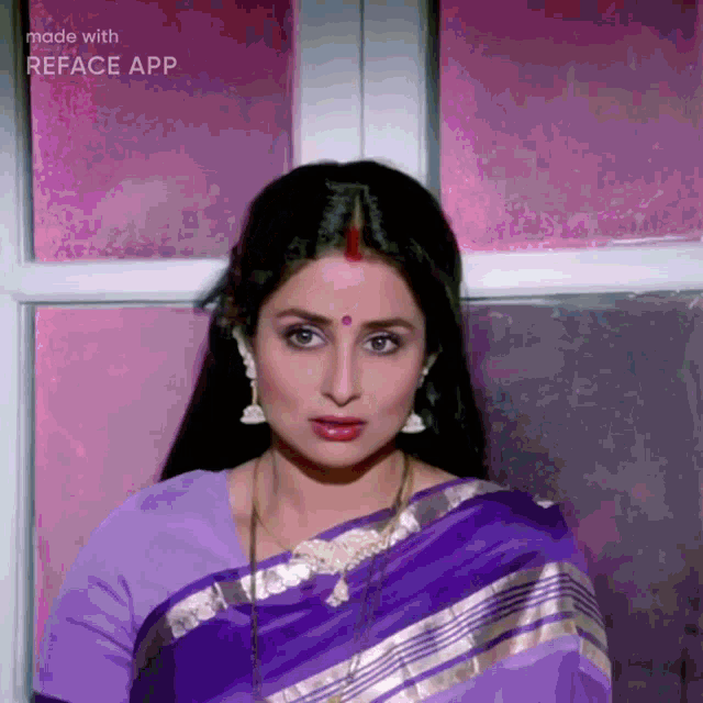a woman in a purple and silver striped saree is made with reface app