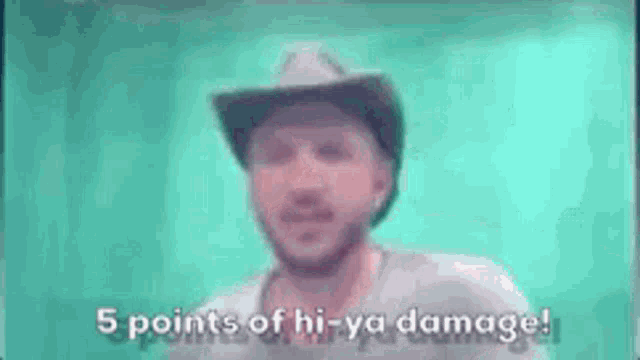 a man wearing a cowboy hat is pointing at the camera with the words 5 points of hi-ya damage .