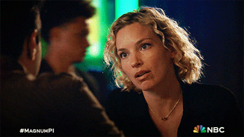 a woman in a black shirt is talking to a man in a nbc advertisement