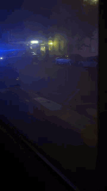 a dark room with a blue light shining on it
