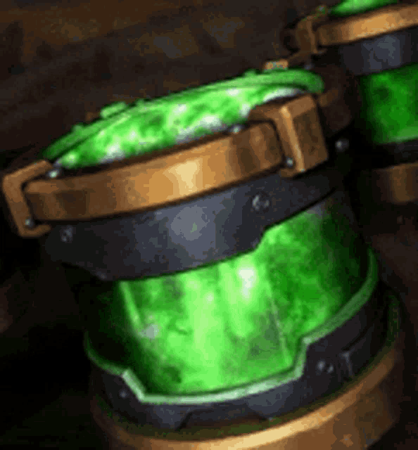 a close up of two green barrels with green liquid inside of them on a table .