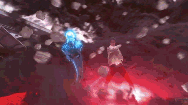 a man in a white shirt and red pants is standing in a dark room with a blue skeleton behind him