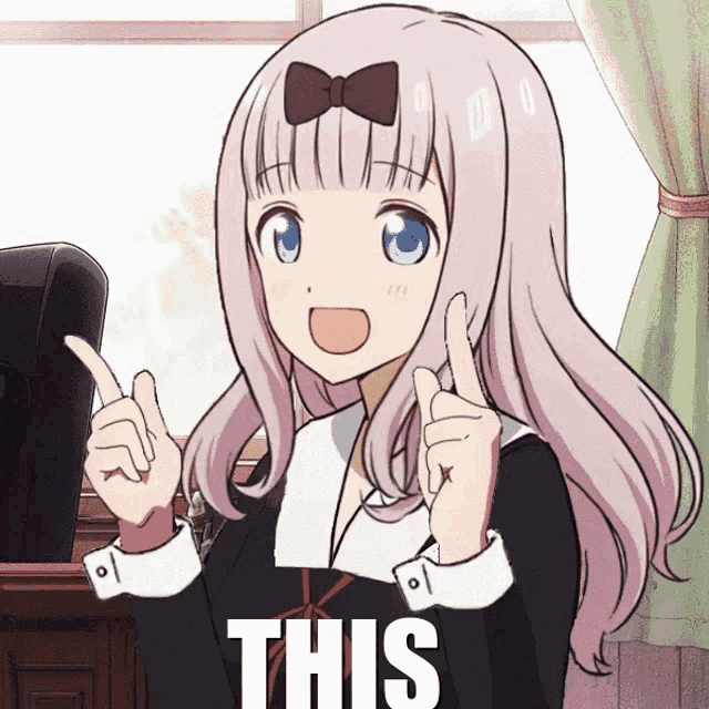 a girl with a bow on her head is pointing up with the word this behind her