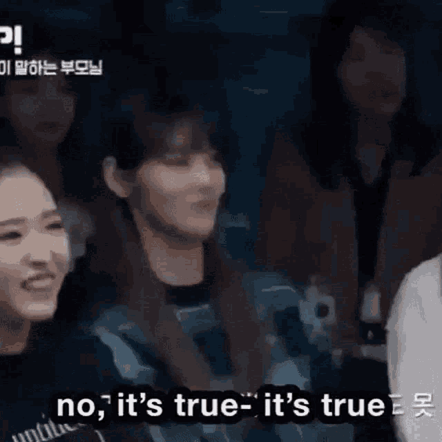 a group of people are sitting in a room and one of them is saying `` no , it 's true . ''