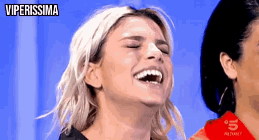 a woman is laughing with the words viperissima written above her