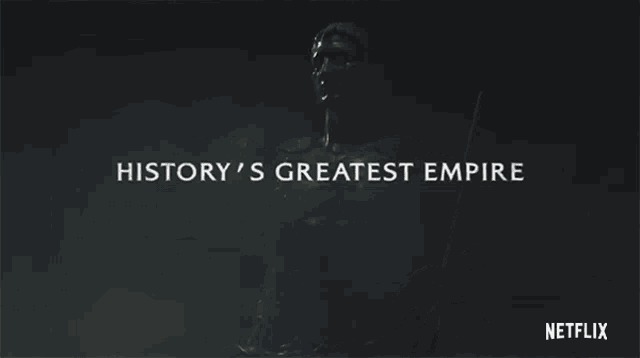 a statue of a man with the words history 's greatest empire above it