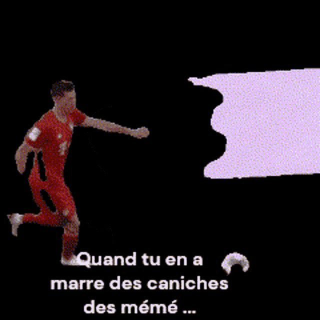 a man in a red t-mobile jersey jumps in the air