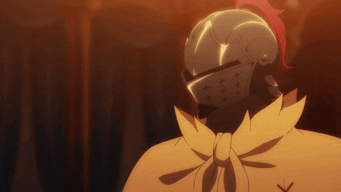 a man wearing a knight 's helmet with the letters x and y on it