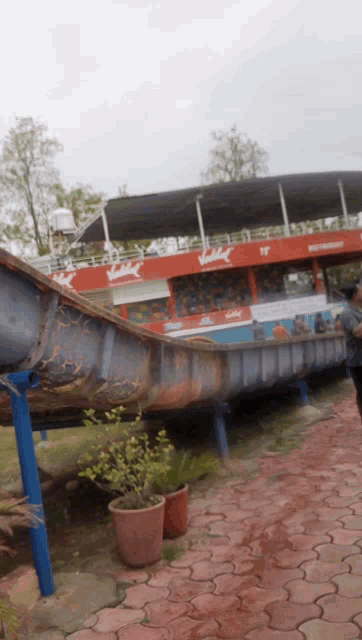a boat with a sign that says restaurant on it