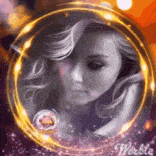 a woman 's face is surrounded by a golden circle .