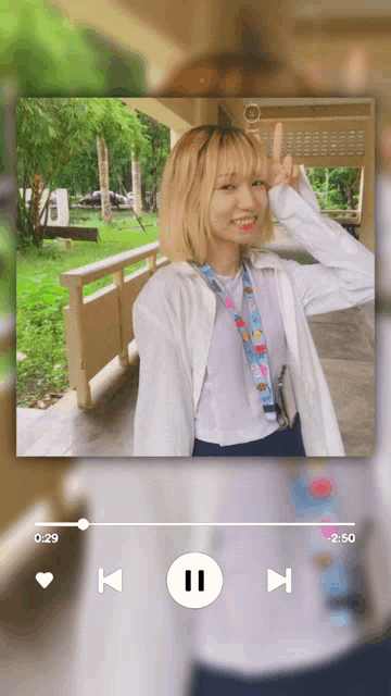 a video of a girl is being played on a phone with the numbers 1:29 and 2:50 on the screen