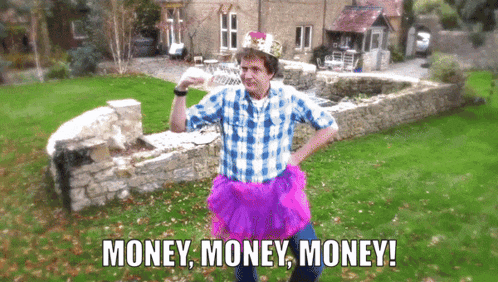 a man wearing a tutu and a crown is standing in front of a stone wall and says money money money