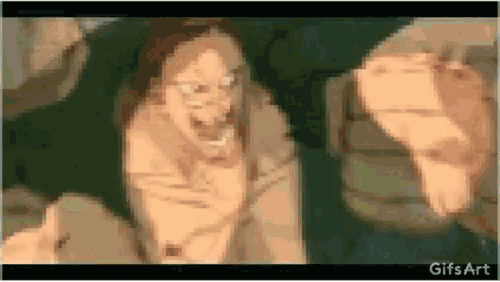 a cartoon of a man and a woman sitting next to each other on a couch .