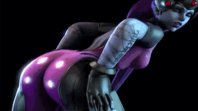 a close up of a woman 's breasts in a purple and black outfit